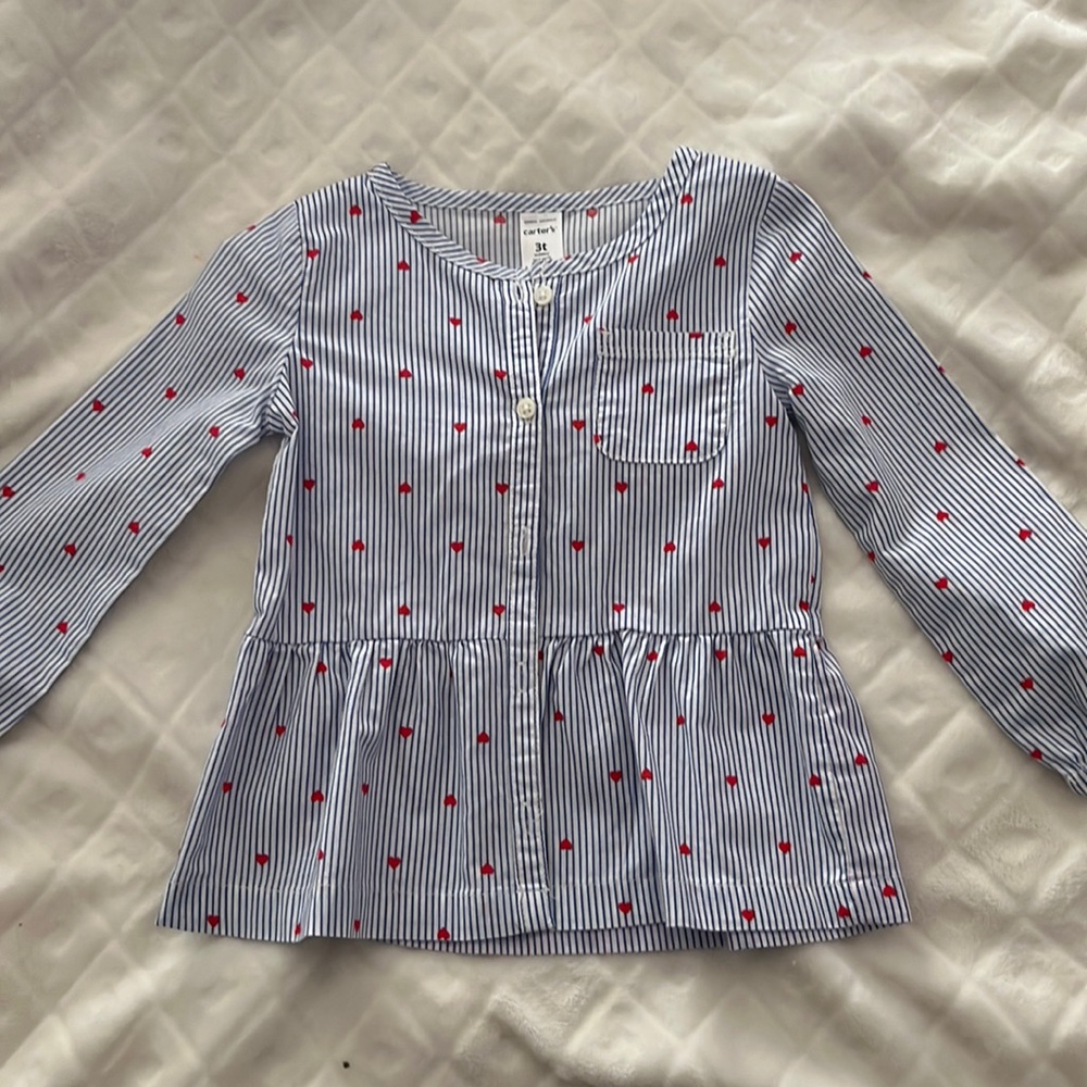 Carter’s blue striped longsleeve three T-shirt with red hearts.